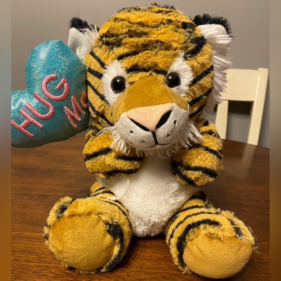 Hug Me Tiger with HUG ME embroidered in pink on a turquoise sparkly - Picture 1 of 12